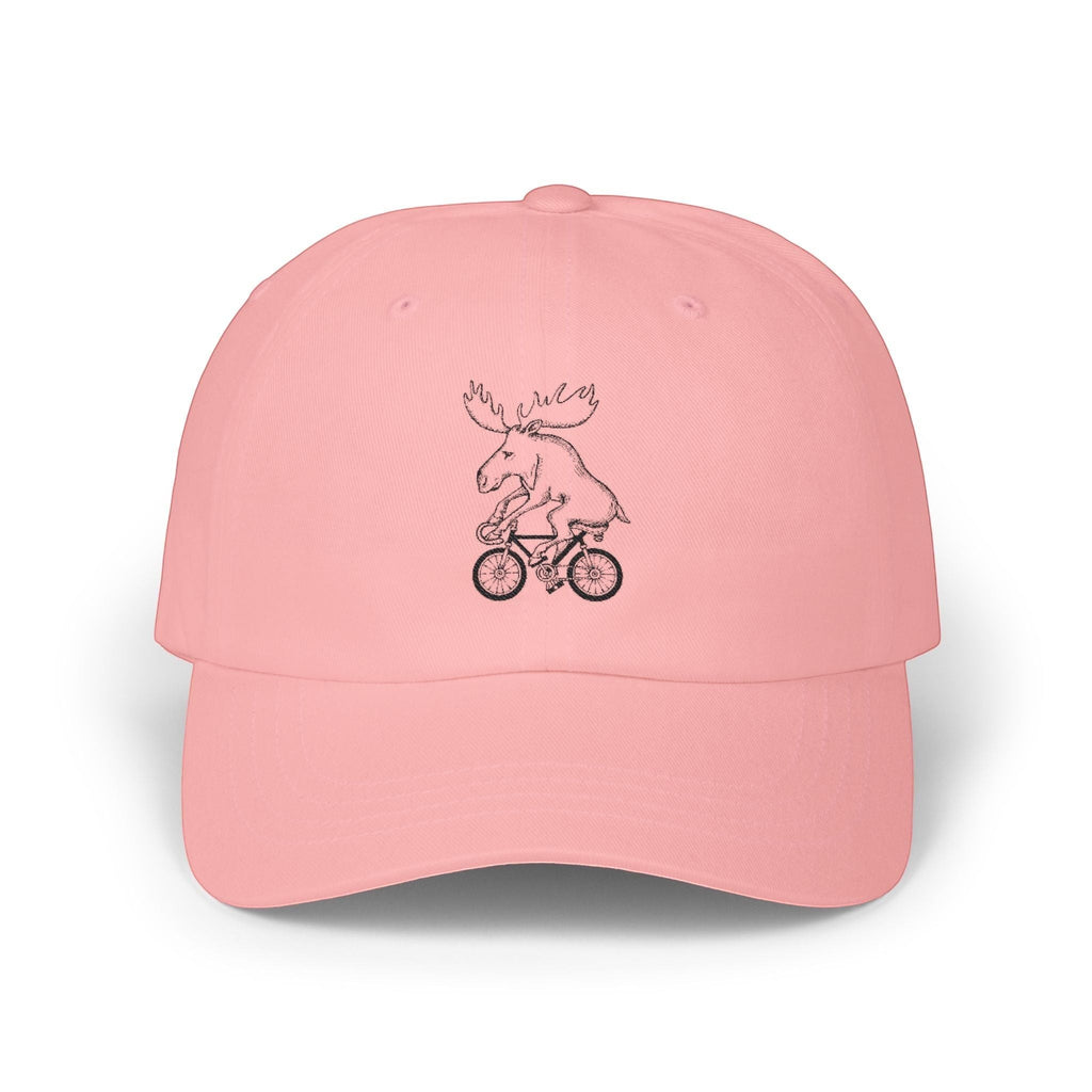 Rack & Cycle pink cotton dad cap with a whimsical moose riding a bicycle embroidered on the front.