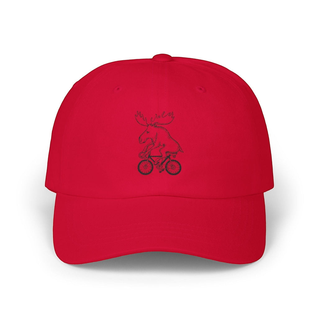 Rack & Cycle red cotton dad cap with a whimsical embroidered moose on a bicycle. Low-profile, casual baseball hat.