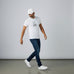 Rack & Cycle white cotton dad cap with embroidered moose on a bicycle. Low-profile, casual outdoor baseball hat.